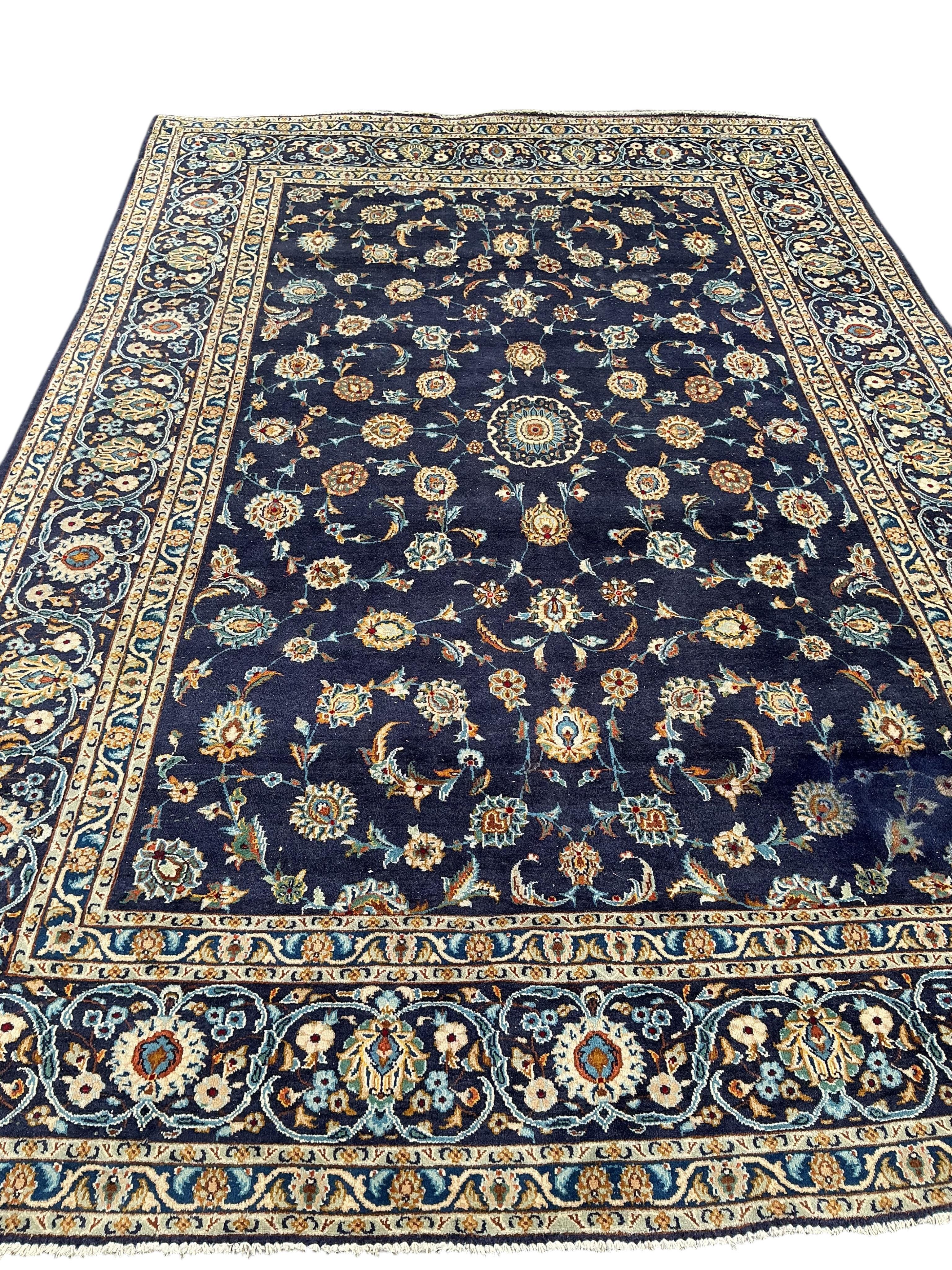 A Tabriz ground carpet, 330 x 219cm